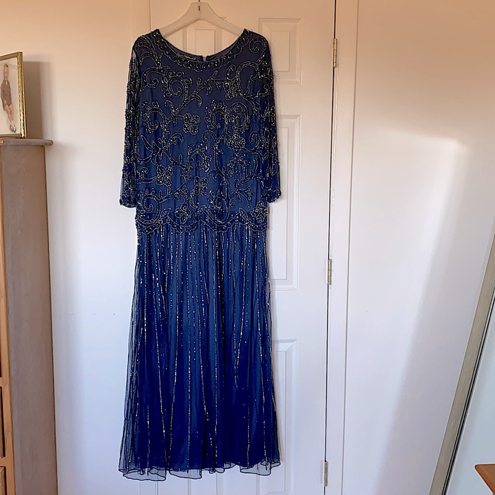 Formal dress, navy blue with all over sequins and beading. 16w worn once.